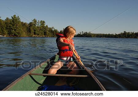 6 year old girl in a canoe View Large Photo Image Picture - 6 year old girl in a canoe. Fotosearch