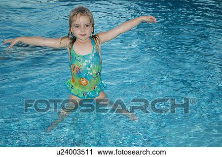 Close-up of a young girl in a swimming pool, Moorea, Tahiti, French Polynesia, South Pacific View Large Photo Image Stock Image - Close-up of a young girl in a swimming pool, Moorea, Tahiti, French Polynesia, South Pacific. Fotosearch