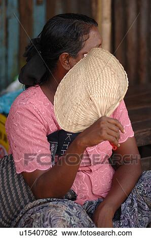 Burmese lady with fan View Large Photo Image Stock Image - Burmese lady with fan. Fotosearch