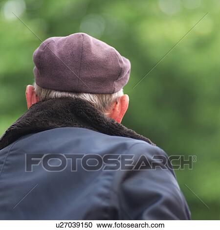 Stock Image - Dublin, Ireland – Back of Man’s Head. Fotosearch