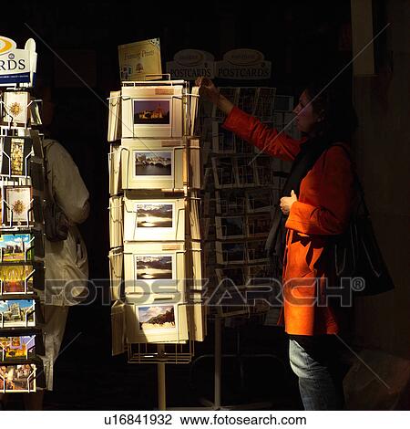 Dublin, Ireland - Tourist selecting postcards View Large Photo Image Stock Image - Dublin, Ireland - Tourist selecting postcards. Fotosearch