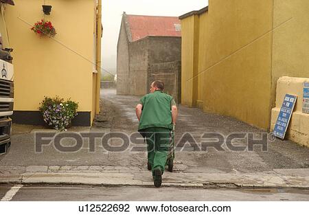 Ireland - Man on street View Large Photo Image Stock Image - Ireland - Man on street. Fotosearch