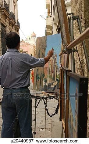 Rear view of a man painting outdoors, Havana, Cuba View Large Photo Image Stock Photo - Rear view of a man painting outdoors, Havana, Cuba. Fotosearch