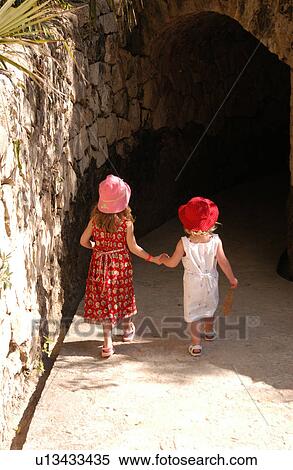 Two Girls Holding Hands View Large Photo Image Stock Photography - Two Girls Holding Hands. Fotosearch