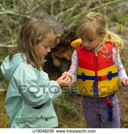 6 and 4 year old in forest View Large Photo Image Stock Photo - 6 and 4 year old in forest. Fotosearch