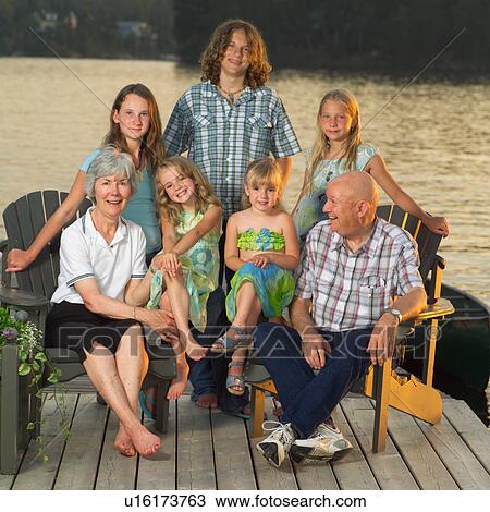 Grandparents posing with grandchildren View Large Photo Image Stock Image - Grandparents posing with grandchildren. Fotosearch
