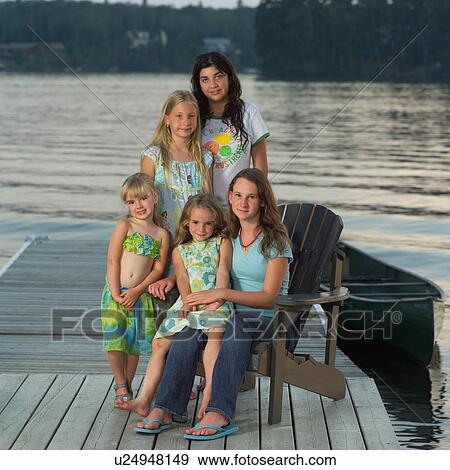 Stock Photo - Group of children posing. Fotosearch