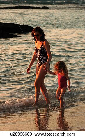 Stock Photo - Family on Beach - Hawaii. Fotosearch