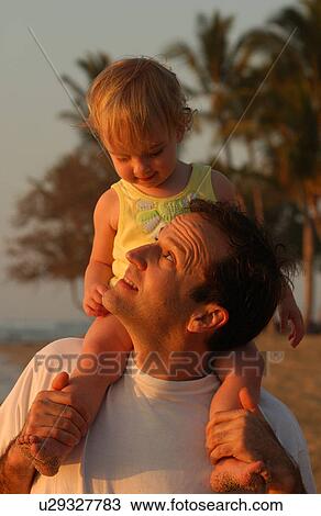 Stock Image - Family on Beach. Fotosearch