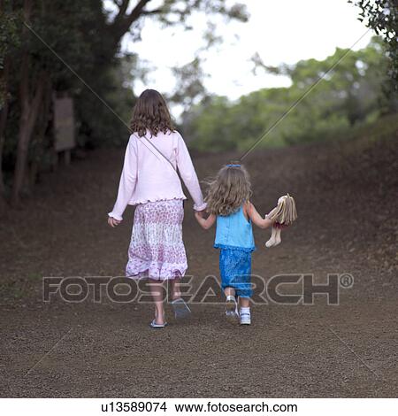 Sisters Holding Hands View Large Photo Image Picture - Sisters Holding Hands. Fotosearch