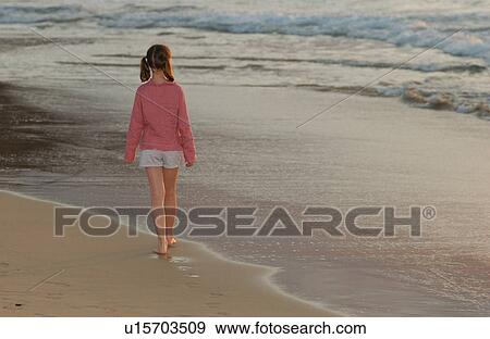 Kids playing on beach - Hawaii View Large Photo Image Stock Photo - Kids playing on beach - Hawaii. Fotosearch