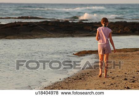Kids playing on beach - Hawaii View Large Photo Image Stock Photo - Kids playing on beach - Hawaii. Fotosearch
