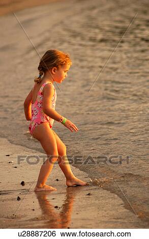Kids playing on beach - Hawaii View Large Photo Image Stock Photograph - Kids playing on beach - Hawaii. Fotosearch