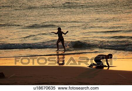 Kids playing on beach - Hawaii View Large Photo Image Stock Photography - Kids playing on beach - Hawaii. Fotosearch