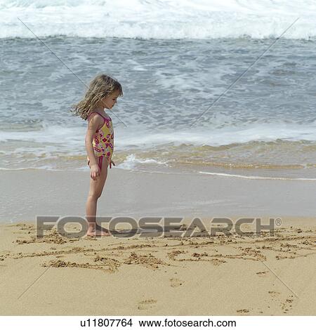 Young Girl at the Beach View Large Photo Image Picture - Young Girl at the Beach. Fotosearch