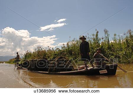 Cargo on flat bottom boat on Inle Lake View Large Photo Image Stock Photograph - Cargo on flat bottom boat on Inle Lake. Fotosearch