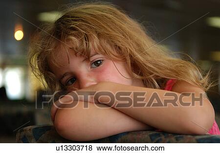 Close-up of a young girl View Large Photo Image Stock Photo - Close-up of a young girl. Fotosearch