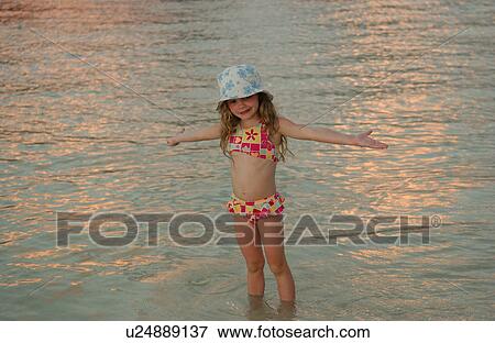 Stock Photo - Close-up of a young girl. Fotosearch