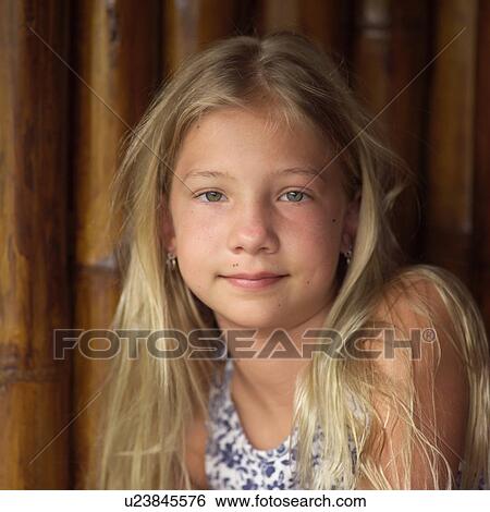 Stock Photograph - Girl Looking at the Camera. Fotosearch