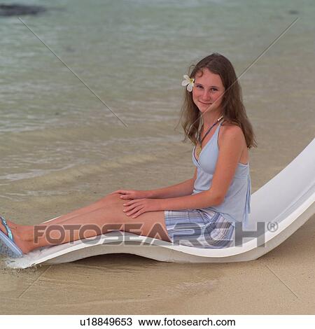 Girl on Beach Lounge Chair View Large Photo Image Stock Image - Girl on Beach Lounge Chair. Fotosearch