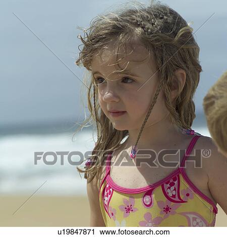 Stock Image - Young Girl at Beach. Fotosearch