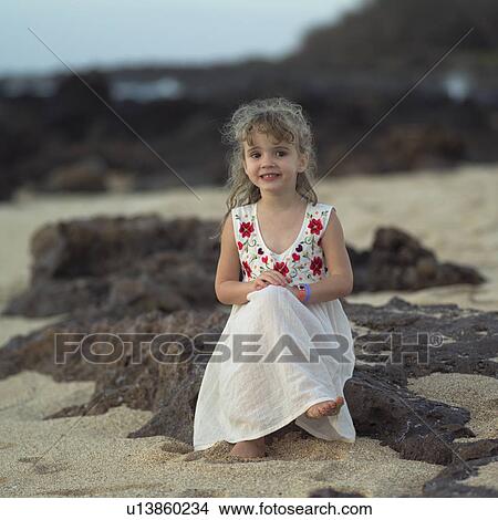 Picture - Young Girl in Dress on Beach. Fotosearch