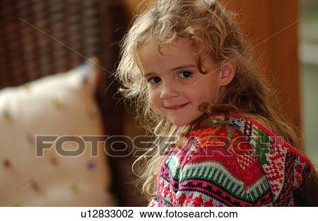 Young girl looking at camera smiling View Large Photo Image Stock Image - Young girl looking at camera smiling. Fotosearch