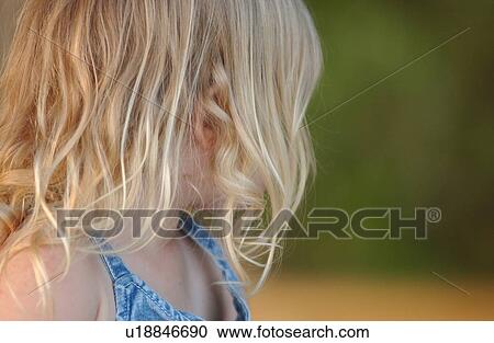 Young girl looking back View Large Photo Image Stock Image - Young girl looking back. Fotosearch