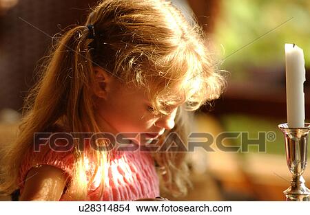 Young girl looking down View Large Photo Image Picture - Young girl looking down. Fotosearch