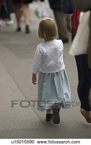 Stock Image - Young Girl on Street. Fotosearch