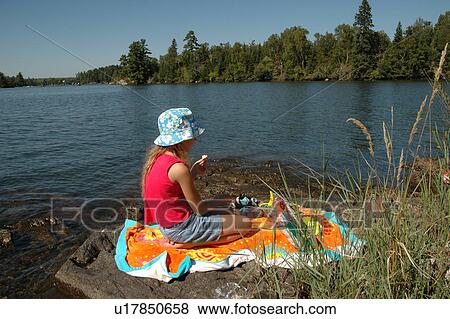 Girl Sitting on Towel View Large Photo Image Stock Photo - Girl Sitting on Towel. Fotosearch