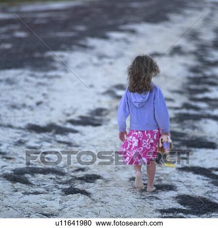 Girl Walking Along Beach View Large Photo Image Stock Image - Girl Walking Along Beach. Fotosearch