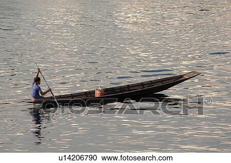Boy rowing on Inle Lake View Large Photo Image Stock Image - Boy rowing on Inle Lake. Fotosearch