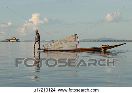 Fisherman in row boat View Large Photo Image Picture - Fisherman in row boat. Fotosearch
