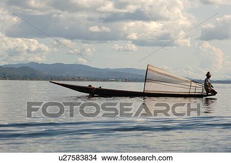 Fisherman in row boat View Large Photo Image Picture - Fisherman in row boat. Fotosearch