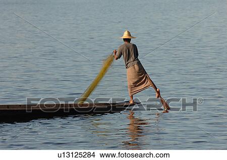 Fisherman leg rowing View Large Photo Image Picture - Fisherman leg rowing. Fotosearch