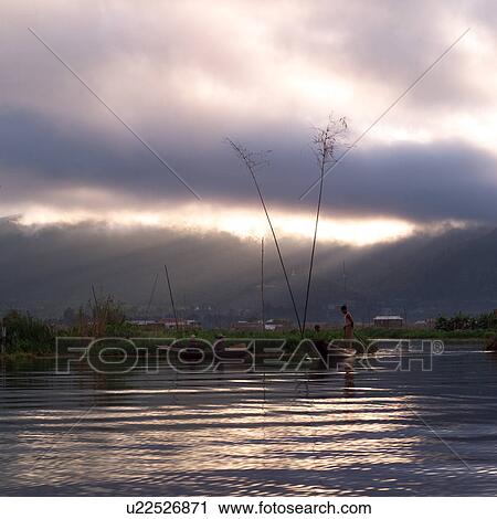 Intha fishermen in flat-bottomed boats View Large Photo Image Stock Image - Intha fishermen in flat-bottomed boats. Fotosearch