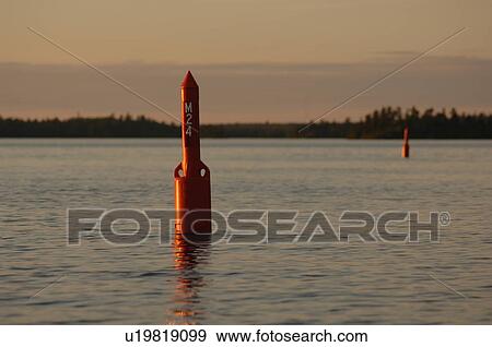 Stock Photo - Buoy on lake. Fotosearch