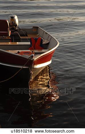 Stock Photo - Empty Boat on Lake. Fotosearch