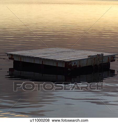 Stock Photo - Floating Dock on Ocean at Moorea in Tahiti. Fotosearch