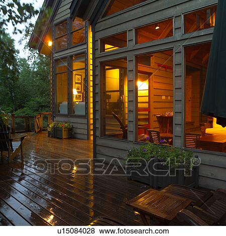 Front porch of a wooden house View Large Photo Image Stock Photo - Front porch of a wooden house. Fotosearch