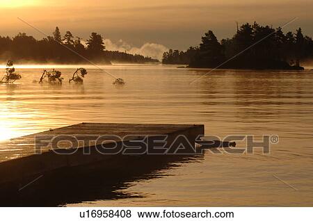 Stock Photo - Lake of the Woods, Canada in autumn. Fotosearch