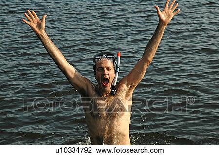 Man with arms outstretched View Large Photo Image Stock Image - Man with arms outstretched. Fotosearch
