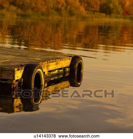 Stock Photo - Tires on Boat Dock. Fotosearch