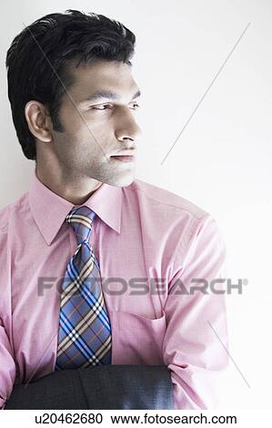 Close-up of a businessman View Large Photo Image Stock Image - Close-up of a businessman. Fotosearch