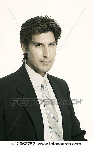 Portrait of a young man thinking View Large Photo Image Stock Photo - Portrait of a young man thinking. Fotosearch