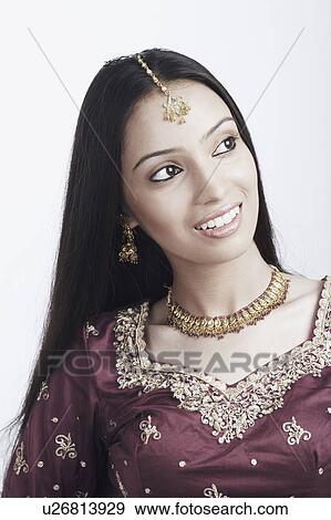 Close-up of a teenage girl smiling View Large Photo Image Stock Photo - Close-up of a teenage girl smiling. Fotosearch