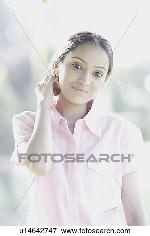 Portrait of a teenage girl thinking View Large Photo Image Stock Photo - Portrait of a teenage girl thinking. Fotosearch