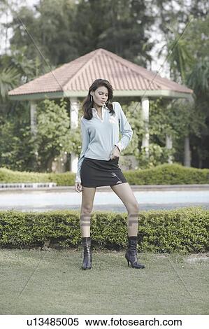 Young woman posing View Large Photo Image Stock Photography - Young woman posing. Fotosearch