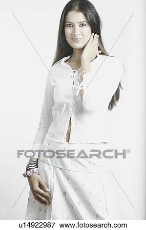 Stock Photo - Portrait of a young woman smiling. Fotosearch
